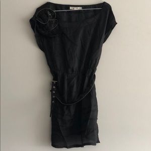 Black belted dress with flower decoration